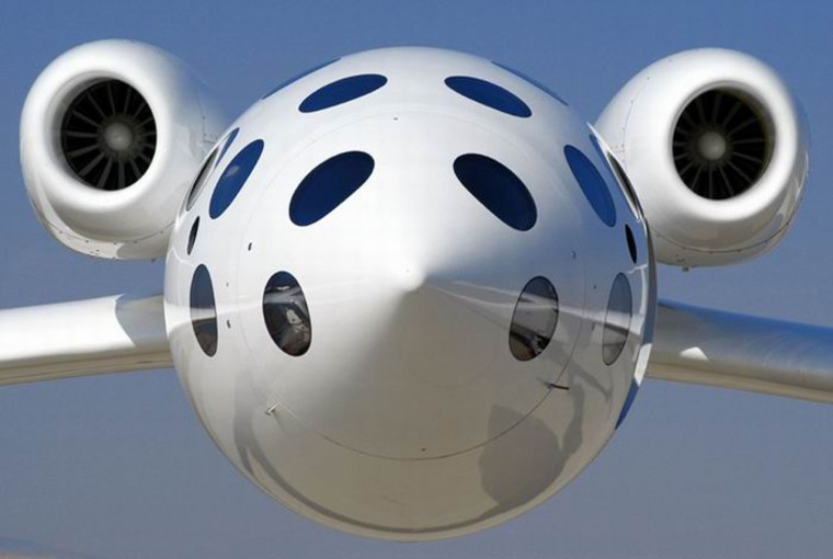 A front-and-center view shows the White Knight carrier plane that was developed for SpaceShipOne operations. Now Scaled Composites is working on a fleet of commercial "SpaceShipTwos."