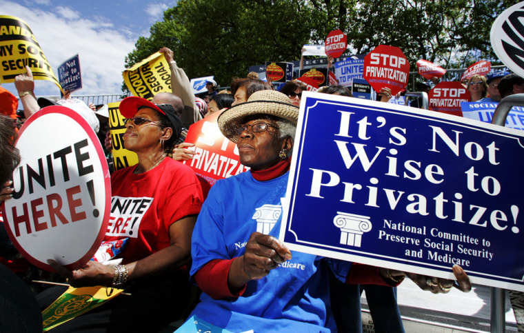 Gladys Mitchell, 80, right, from Washington, and Louise Hobbs, 71, left, from New York, N.Y. join a rally against the privatization of Social Security, on Capitol Hill on Tuesday.