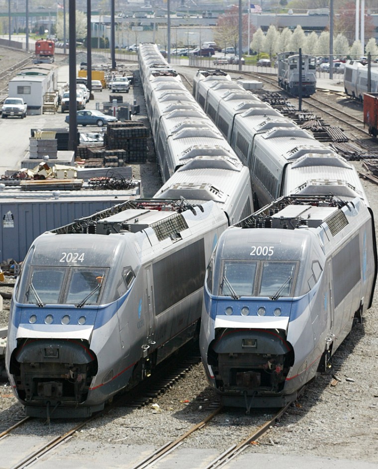 Four Amtrak high-speed Acela trains sit motionless on a side track after Amtrak discovered brake problems with the Acela Express service.