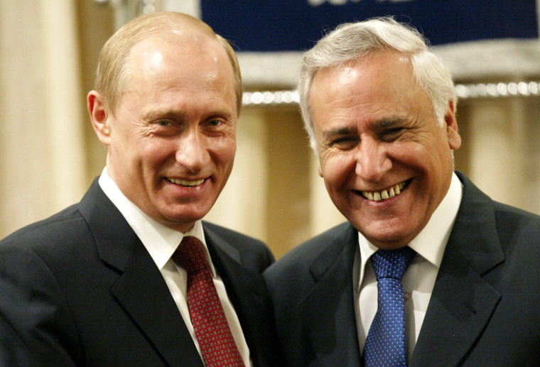 Russian President Vladimir Putin, left, meets Israeli President Moshe Katsav at the President's residence in Jerusalem, Thursday, April 28, 2005. Israeli leaders had tough messages Thursday for Putin on the second day of his historic visit: they object to Putin's proposal to host an international Mideast peace conference, his plan to sell anti-aircraft missiles to Syria and his support for Iran's nuclear program. (AP Photo/Oded Balilty)