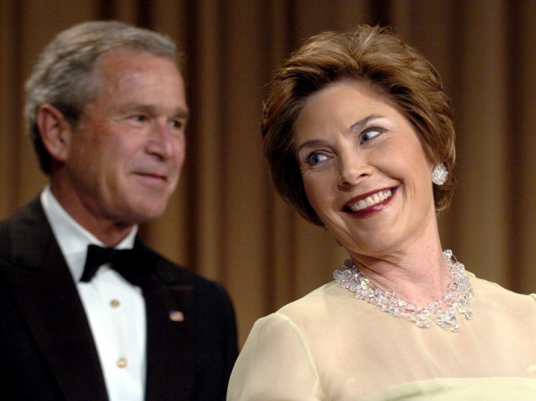 First lady Laura Bush roasts President Bush at the White House Correspondents' dinner in Washington