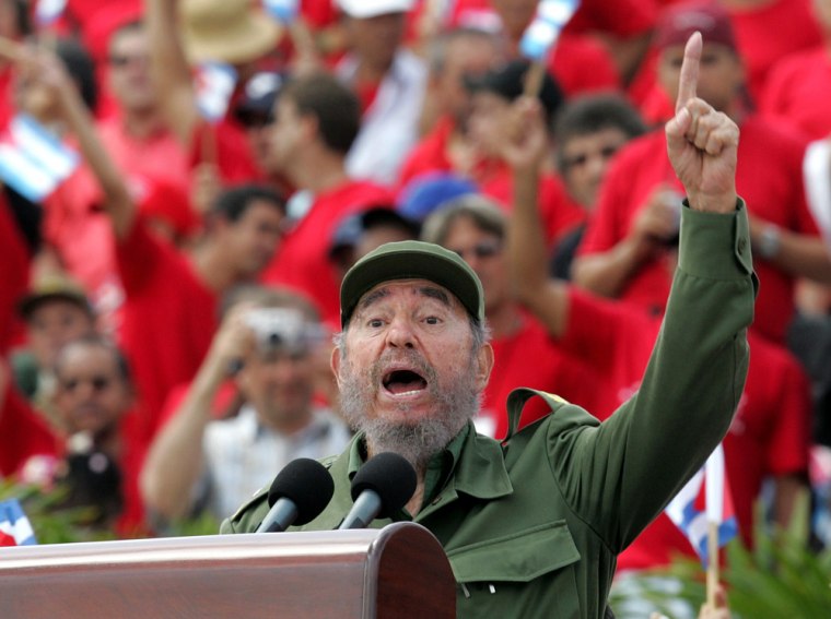 Cuban President Castro addresses crowd during May Day parade on Revolution Square