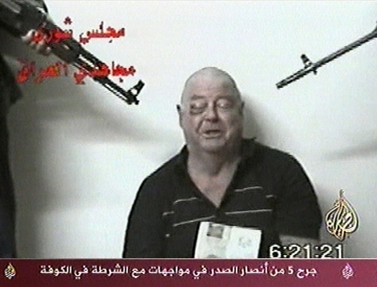 A video aired by the Arab television station al-Jazeera on Friday shows Australian engineer Douglas Wood, 63, reportedly held hostage by a group called the Shura Council of the Mujahedeen of Iraq.