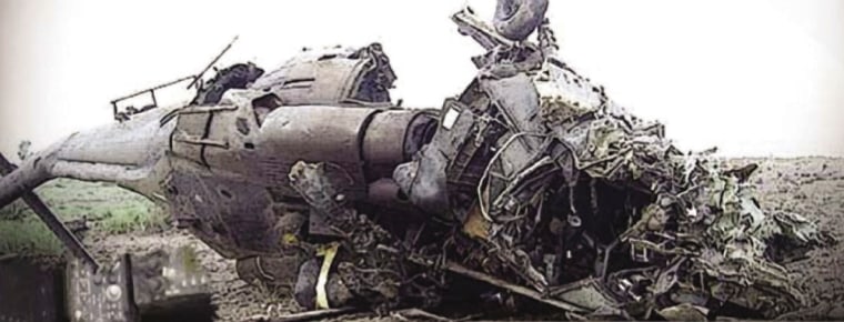 Wreckage of a Black Hawk helicopter in eastern Afghanistan. After the helicopter's pilot complied to a colleague's request to "Fly hard", the controls jammed and the $6 million aircraft crashed, killing crew chief Sgt. Daniel Lee Galvan.
