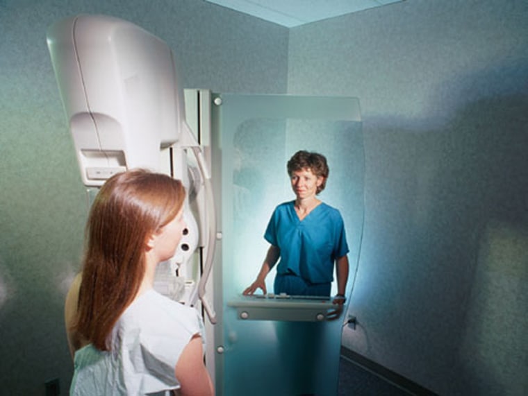 An X-ray technician gives a woman a mammogram. More than a million women worldwide each year are diagnosed with breast cancer, researchers say.