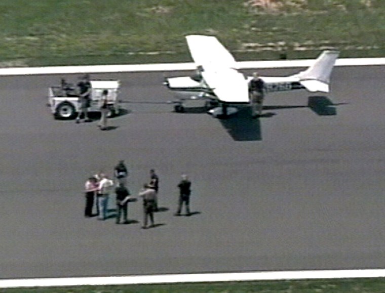 In this image made from video, the two-seater Cessna that caused a scare in Washington, D.C., sits on the runway at Frederick Municipal Airport in Frederick, Md. on Wednesday.