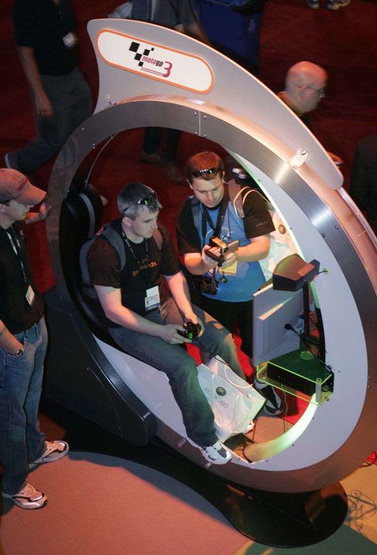 Game enthusiasts at XBox 360 booth at Electronic Entertainment Expo in Los Angeles