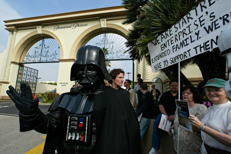You've seen them: Star Wars fans waiting for the latest movie's opening night months in advance, or Star Trek convention geeks dressed in polyester suits talking about the space time continuum. But which giant franchise has the upper hand? Forbes.com weighs in.