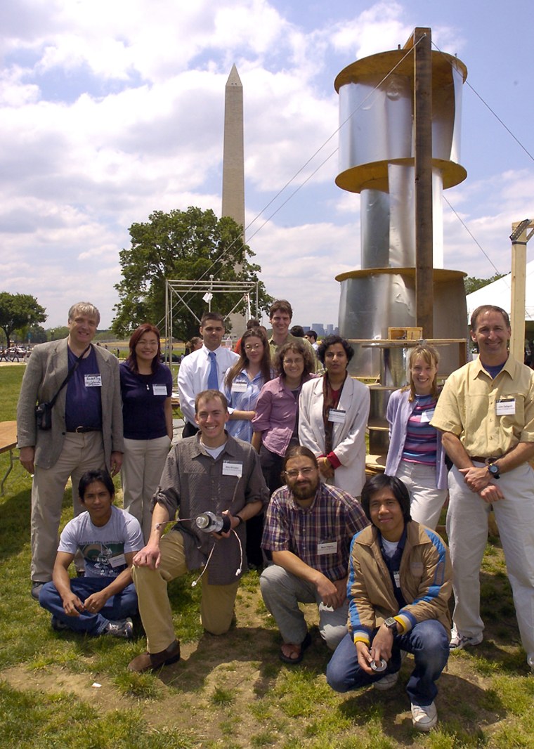 University of Colorado students and professors pose with a wind turbine design they are studying for use in a village in India. The turbine could some day generate electricity as well as pump water and grind grain in the village. The team was one of seven winners at an EPA-sponsored “sustainable design” contest held on the National Mall in Washington, D.C.