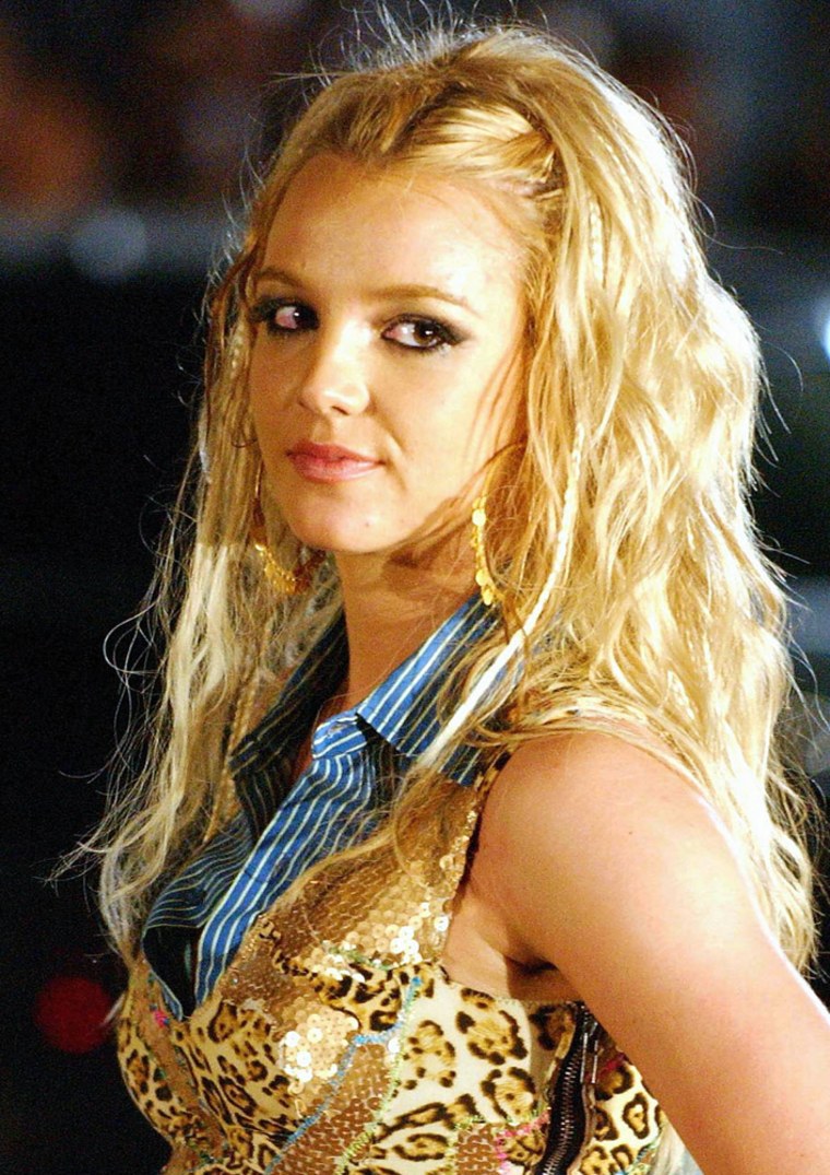 ** FILE ** Britney Spears appears on set filming her new video when she injured her knee, in this June 8, 2004 file photo in Queens, New York.   (AP Photo/Jennifer Graylock, File)