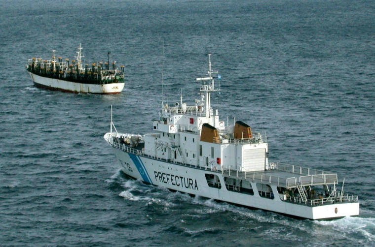 A ship with Argentina's Naval Prefecture chases a Korean fishing boat last week in the Atlantic Ocean near Comodoro Rivadavia.