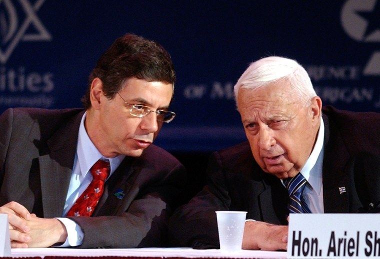 Israeli Prime Minister Ariel Sharon, right, speaks with Israeli Ambassador to the United States Daniel Ayalon during a meeting of Jewish community leaders Sunday, May 22, 2005 at Baruch College in New York. (AP Photo/Chad Rachman)