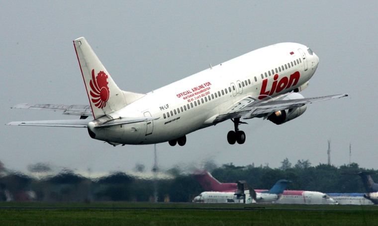 Boeing 737-400 owned by Indonesian Lion Airline takes off from the International Sukarno-Hatta Airport