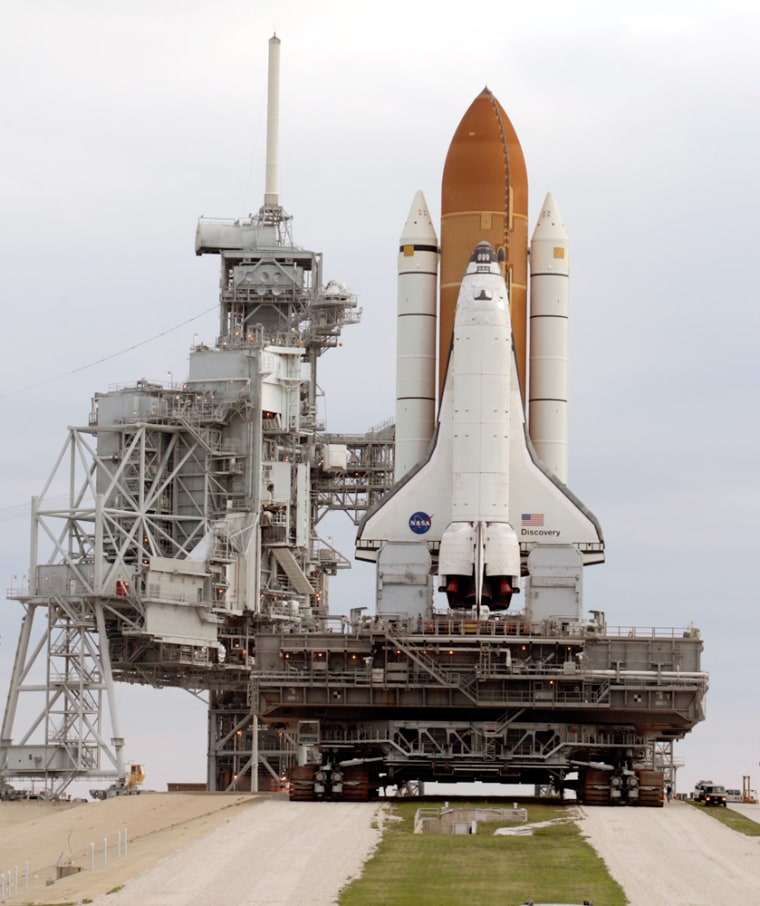 Space shuttle Discovery moves back to the Vehicle Assembly Building at Cape Canaveral