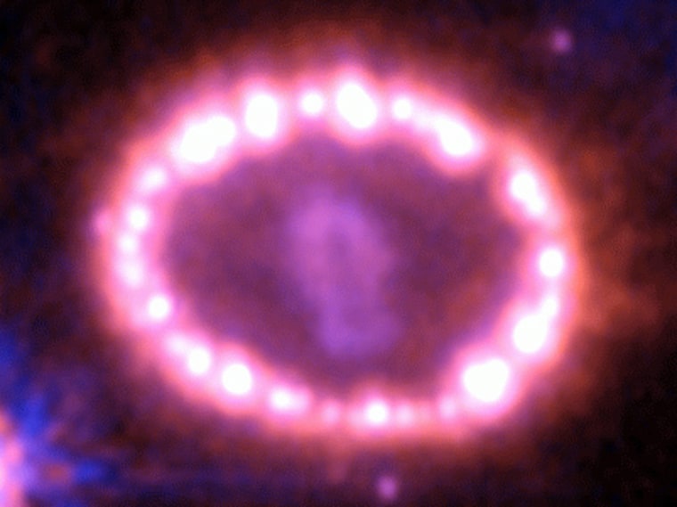 The remnant of supernova 1987A shows no sign of the neutron star scientists believe is lurking at its heart. The Hubble Space Telescope took this image in December 2004.