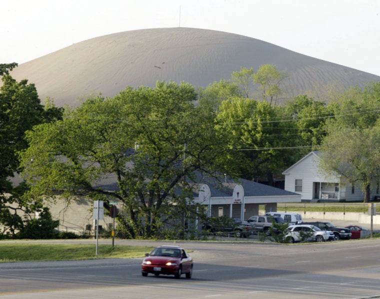 This 30-story high mound of coarse waste from the milling process serves as a backdrop for the eastern Missouri town of Park Hills.