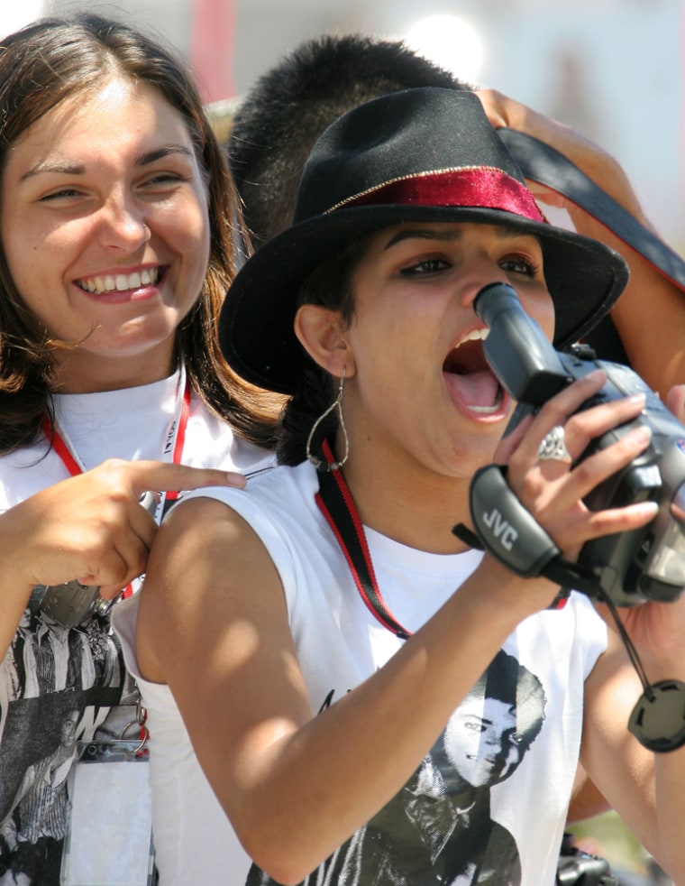 Unidentified Michael Jackson fans react to the verdicts of not guilty in front of the Santa Barbara County Courthouse in Santa Maria, Calif., Monday.