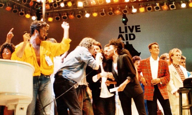 **FILE** British and Irish singers perform on stage at the Live Aid concert at Wembley Stadium, London, England, on July 13, 1985. From left are George Michael of Wham, Bob Geldolf, Bono of U2, Freddie Mercury of Queen, Andrew Ridgley of Wham! and Howard Jones. It may be hard for next month's Live 8 concert to be as historic or even heart-warming as the 1985 Live Aid show, one of the greatest rock concerts of all time. (AP Photo)