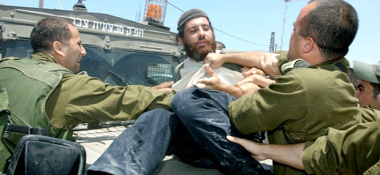 Israeli security forces clash with an ul