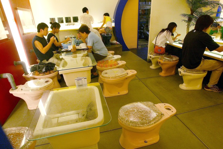 Diners take their meals at toilet-themed restaurant in southern Taiwan city of Kaohsiung