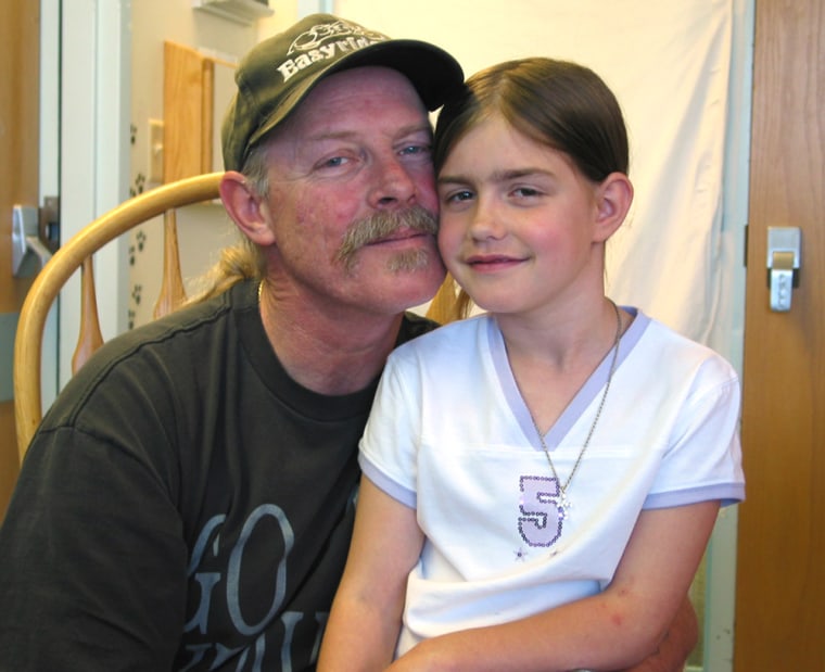 Shasta Groene is reunited with her father, Steven Groene, in this photo taken on Monday.