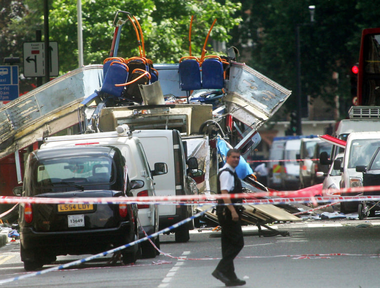 Emergency worker walks near the scene of an explosion near Russell Square in London