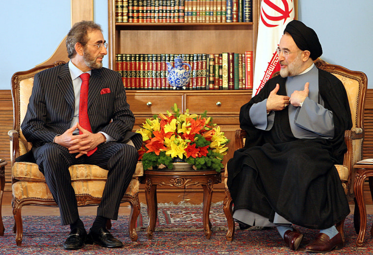 Iranian President, Mohammad Khatami, right, talks with Iraqi Defense Minister,  Saadoun al-Duleimi, during their official meeting in Tehran on Thursday. 