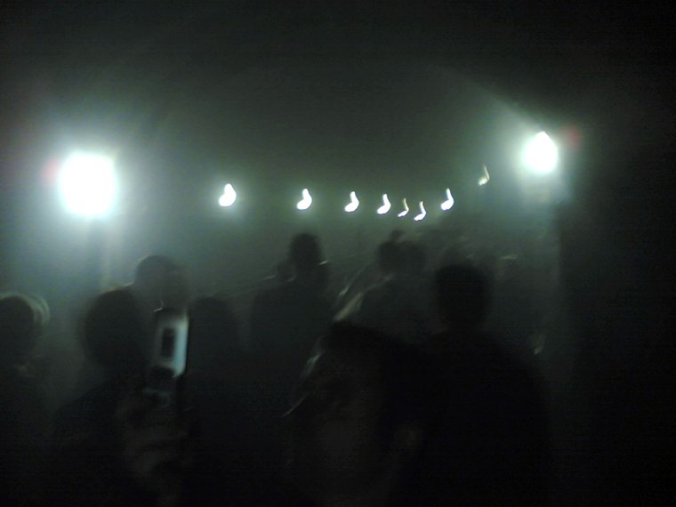 Commuter Alexander Chadwick took this image of passengers being evacuated in a tunnel near Kings Cross station in London early Thursday with his cameraphone.