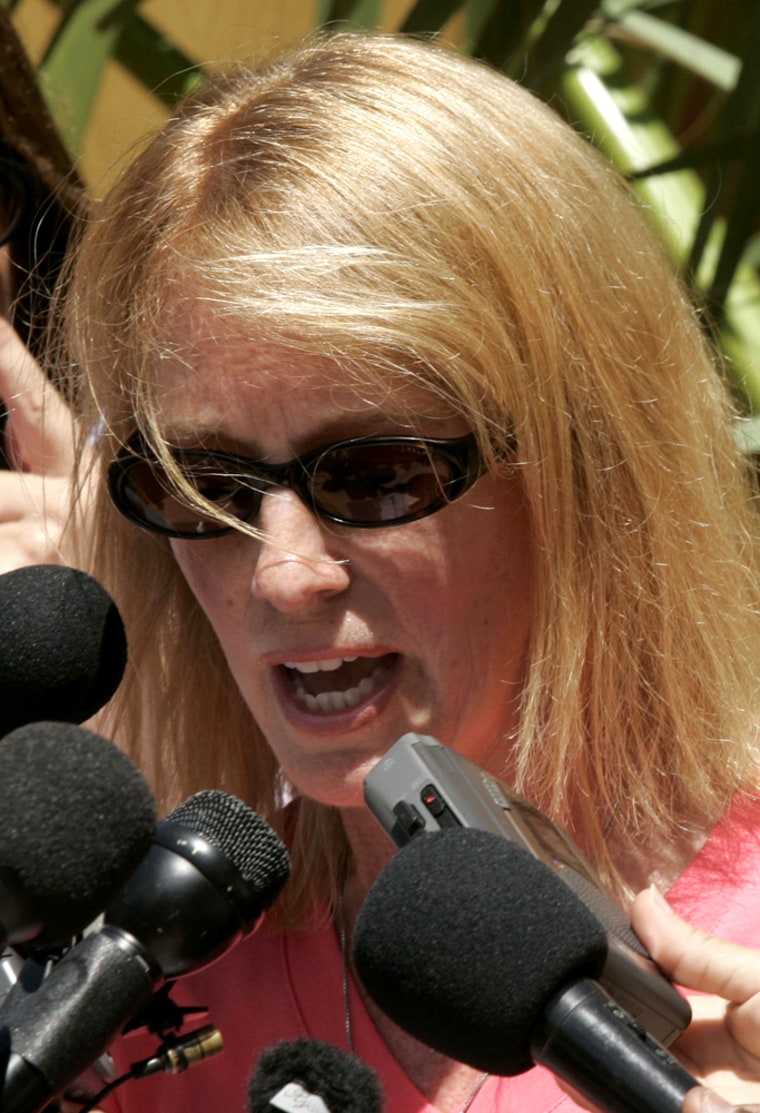 Beth Holloway Twitty, mother of missing teen Natalee Holloway, talks to reporters Friday outside her attorney's office in Oranjestad, Aruba.