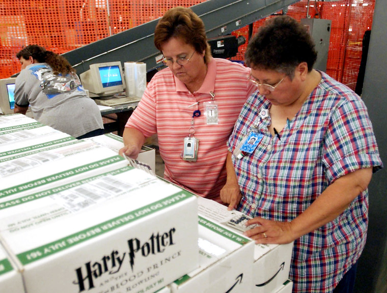 Auditors Frand Linse, left, and Laurie Bertrand check copies of “Harry Potter and the Half-Blood Prince,'' earlier this week at the Amazon.com Fulfillment Center in Fernley, Nev. The books will be delivered July 16, and crews have already prepared more than 800,000 orders.