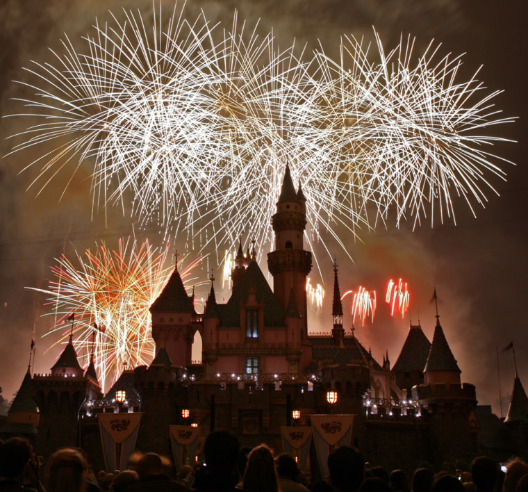 Fireworks expolde behind Sleeping Beauty's Castle during the premiere of "Remember...Dreams Come True" fireworks show as Disneyland's celebrates its 50th anniversary Wednesday, May 4, 2005, in Anaheim, Calif.