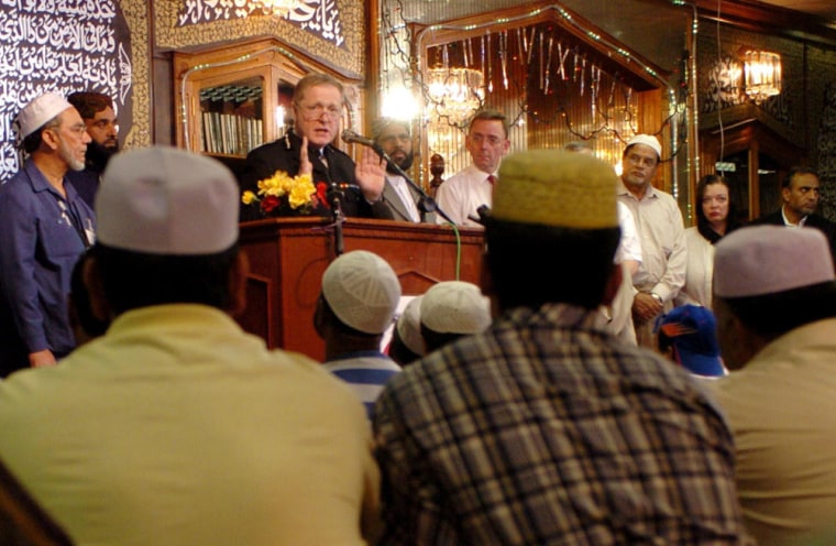 Metropolitan Police Commissioner Sir Ian Blair addresses  Muslims at a mosque in east London on Friday, urging them to "seize the moment" and mount a campaign to counter terrorism and attacks like the one in London on July 7.
