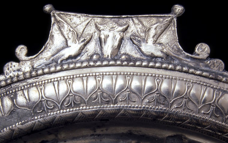 Handout photo showing details of one of the decorated cups and silver platters unearthed from the ruins of the 2,000 year old volcanic eruption of ancient Pompeii