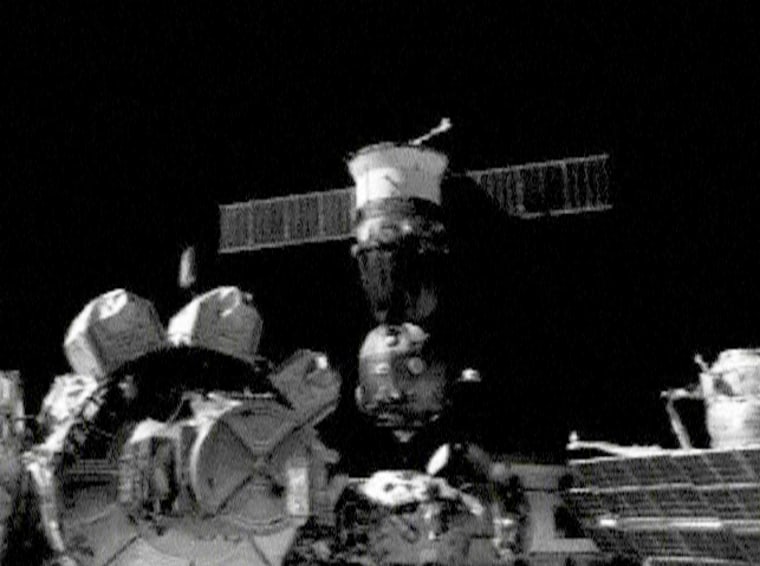 The Soyuz spacecraft prepares to redock with the space station on Tuesday.