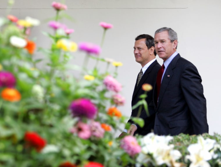US President Bush and Supreme Court nominee Roberts walk toward Oval Offie, White House