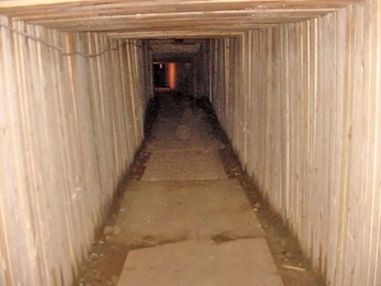 Handout photo shows tunnel dug by drug traffickers under US-Canada border in Aldergrove, British Columbia
