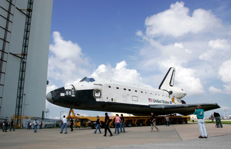 Space shuttle Atlantis moved to prepare for launch and possible rescue mission