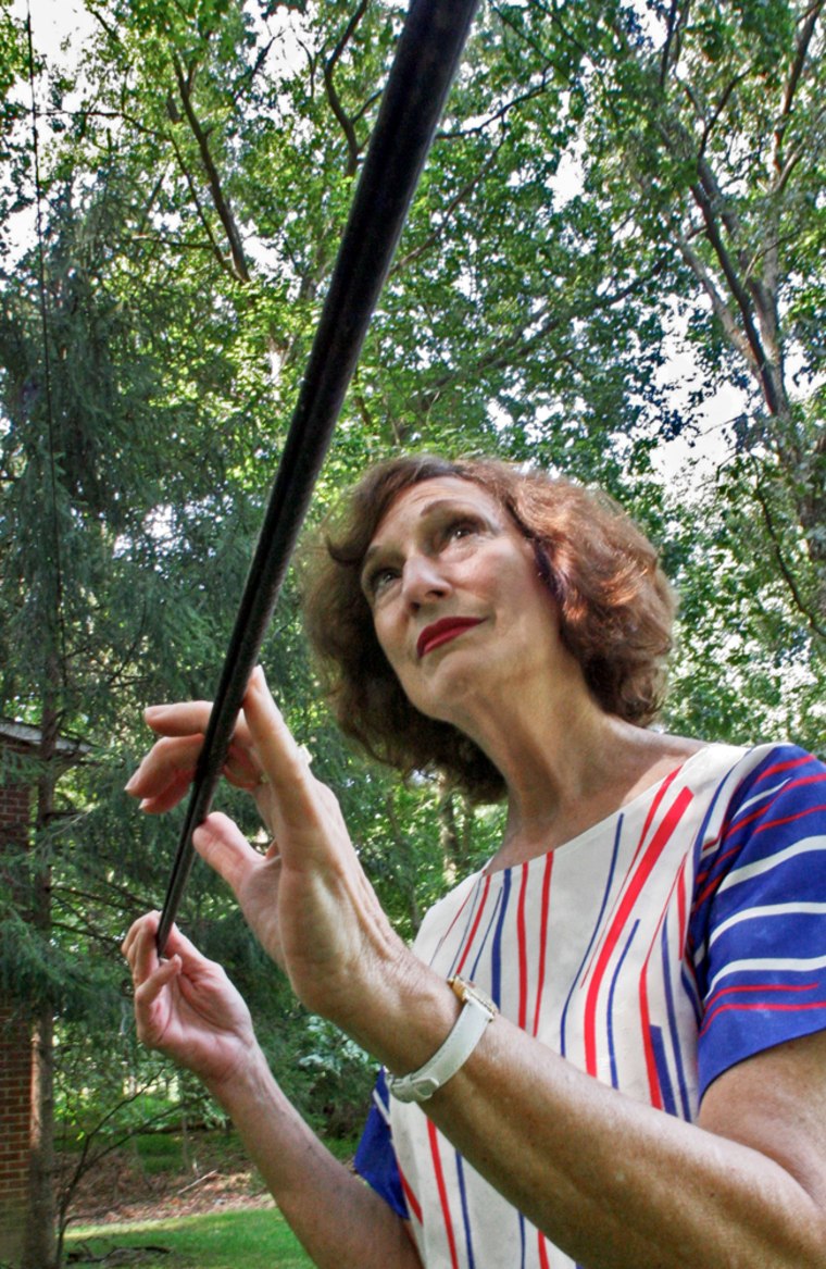 Doris Margolis of Silver Spring, Md., has been living with a Comcast cable hanging at a very low altitude across her front yard for months.