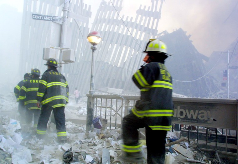 Thousands of pages of oral histories of firefighters’ recollections of Sept. 11, 2001, were released Friday. Firefighters in this photo arrived on the scene after the collapse of the first World Trade Center tower. 