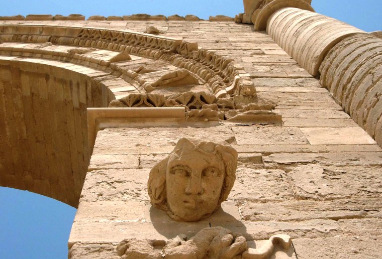 The face of a woman stares down at visitors in the Hatra ruins, 200 miles north of Baghdad, Iraq.