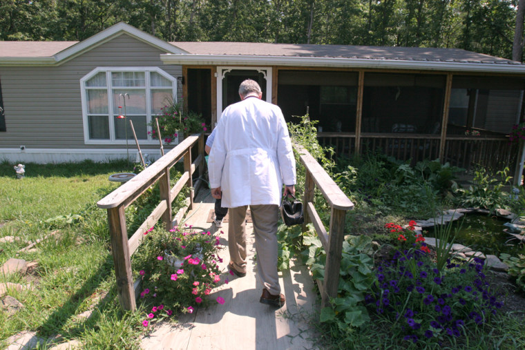 Dr. Robert Prasse makes a house call to his patient Estelle Ashby in Spotsylvania, Va., on Tuesday.