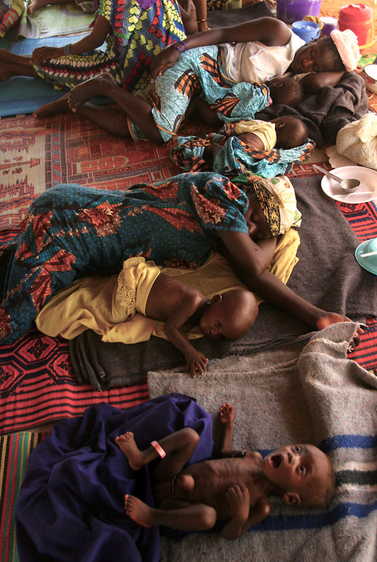 Thirteeen-month Furey Garba cries as mothers and other children rest in the phase one ward of the Doctors Without Borders hospital in Maradi, Niger.