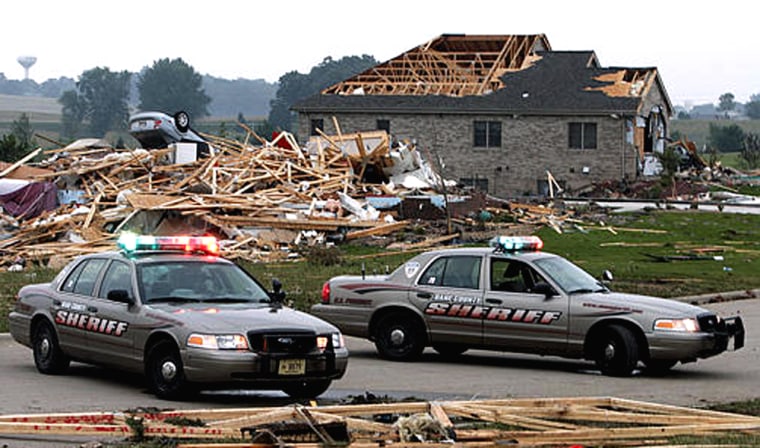 Some of the homes damaged or destroyed by a tornado in Stoughton, Wis., are seen here Friday morning.