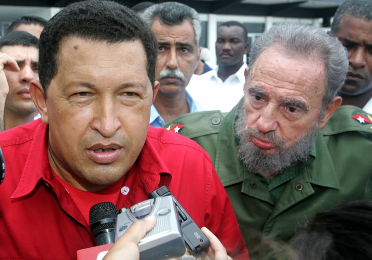 Cuban President Fidel Castro and his Venezuelan counterpart Hugo Chavez talk to media in Havana