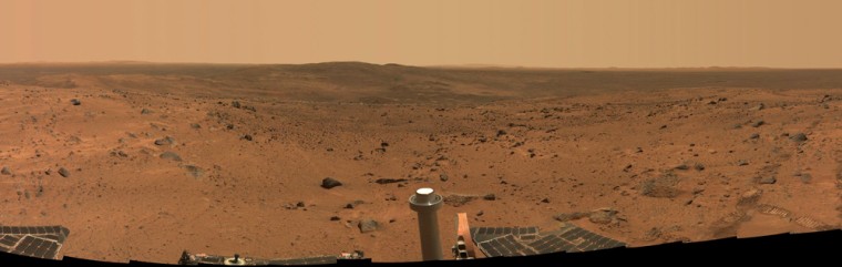 This approximate true-color panorama is a mosaic of images taken by Spirit over a period of three days last week, spanning a 240-degree view of Gusev Crater on Mars.