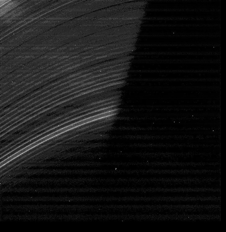 A picture from Cassini shows fine structure in Saturn's D ring, which could be related to perturbations from the planet or its magnetic field. Scientists say the D ring has grown dimmer in the past 25 years.