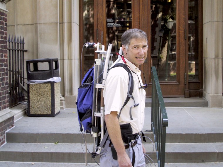 Backpack inventor Larry Rome wearing his energy generating backpack.