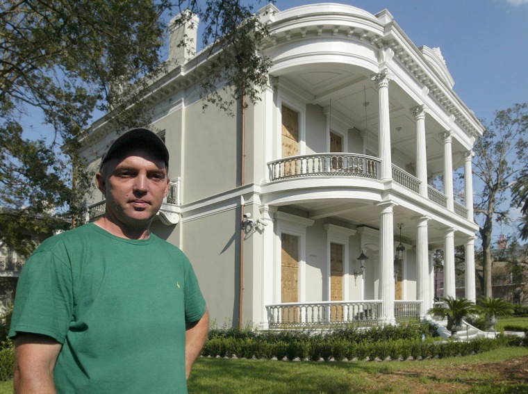 John Crouch keeps an eye on the Sinclair-Robinson House, owned by an out-of-town friend. Crouch was largely responsible for the restoration of the Greek Revival Home.