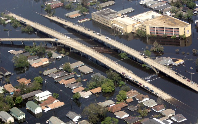 An aerial view shows a partially sunken highway in New Orleans