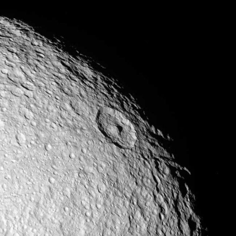 The northern polar region of Tethys, seen in this Cassini flyby image, is a ponderously ancient surface.